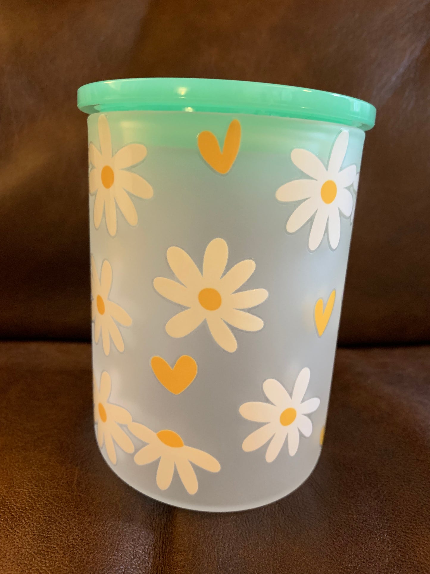 Frosted glass mug with daisies & gold hearts.