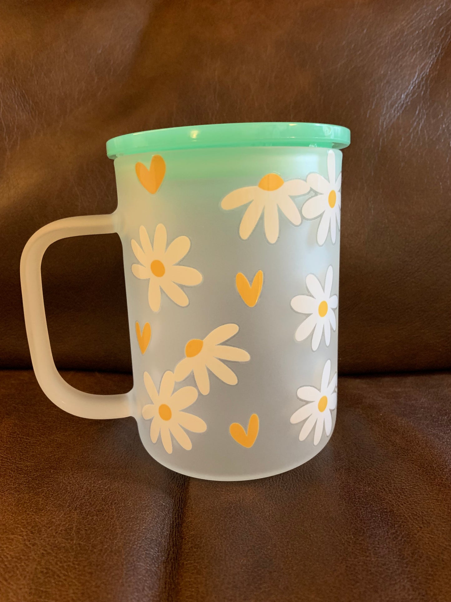 Frosted glass mug with daisies & gold hearts.